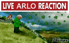 a man in a green shirt is kneeling on a grassy hill with a sign that says live arlo reaction