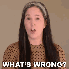a woman says what 's wrong in a polka dot shirt