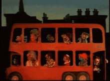 a double decker bus with a group of people on it