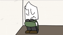 a cartoon of a person with a piece of paper on their head sitting in a corner .