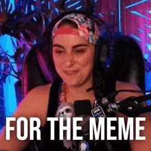 a woman wearing headphones and a headband is sitting in front of a microphone with the words `` for the meme '' .