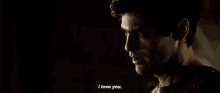 a close up of a man saying `` i love you '' .