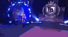 a man in a purple and gold outfit is walking in front of a large fireball