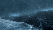 a painting of a stormy night with a mountain in the foreground