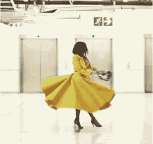 Twirling Yellow Dress GIF - Twirling Yellow Dress Dress GIFs