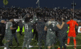 a group of soccer players with one wearing number 37