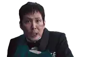a man in a tuxedo with the number 456 on his chest