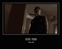 a poster of a man with a blindfold and the words nie ma