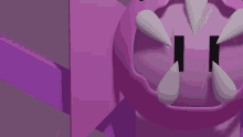 a close up of a purple object with sharp teeth .