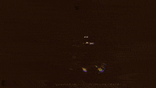 a large explosion in the desert with a lot of smoke coming out of it