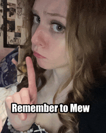 a woman making a funny face with the words remember to mew written below her