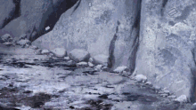 a painting of a river surrounded by rocks and a sign that says ' a ' on it