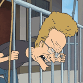 a cartoon of beavis talking on a cell phone behind bars