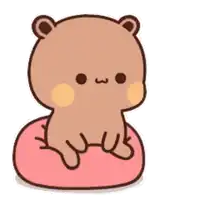 a cartoon bear is sitting on a pink pillow with its eyes closed .