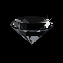 a black diamond against a black background with a sparkle