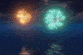 fireworks are displayed in the night sky over the water