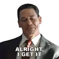 a man in a suit and tie has the words alright i get it on his face