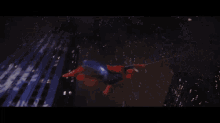 a spider man is flying through the air in a blurry photo