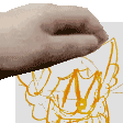 a close up of a person 's hand holding a piece of paper with a drawing of a person on it .