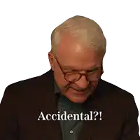 a man wearing glasses and a suit says accidental on a white background