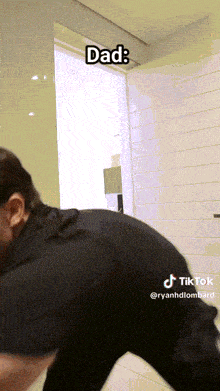 a man 's butt is shown in a tiktok video with the caption " dad "