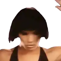 a close up of a woman 's head with a wig on