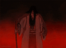 a man in a red robe is holding a sword in his hands .