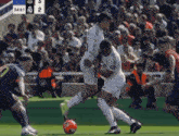 a soccer game between real madrid and fc barcelona