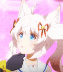 a girl with a cat 's ears and a bow on her hair .