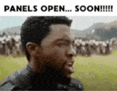 a man is making a funny face with the words panels open soon below him
