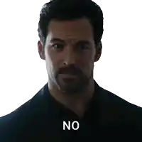 a man with a beard and a black shirt says " no "