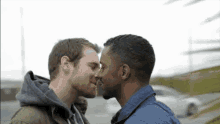 biracial gay kissing