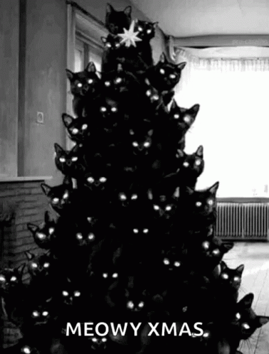 [Image: black-cat-christmas-tree.gif]