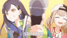 a couple of anime girls are standing next to each other and a person is holding a microphone .