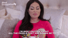 a woman is laying on a bed with the words i 'm most excited about all the people that are gonna be there