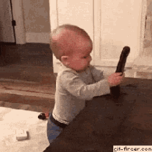Baby Remote GIF - Baby Remote Cry GIFs