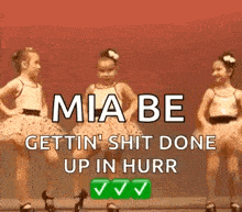 two little girls are dancing together with the words `` mia be gettin ' shit done up in hurr ''