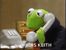 a kermit the frog is talking on a telephone and says hi this is keith