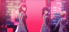a group of anime girls are dancing on a stage in front of a city skyline .