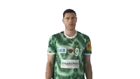 a man in a green shirt with the number 93 on the front