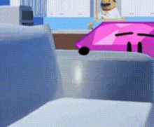 a pink cartoon character is sitting on a chair in a room .