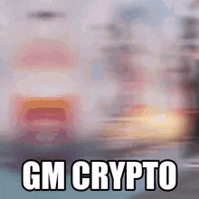 a blurry picture with the words " gm crypto " in white letters