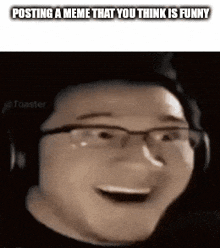 a man wearing glasses and headphones is smiling in a meme .