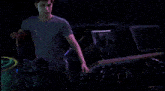 a person standing next to a purple object that says dawn on the bottom right