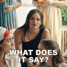 a woman says what does it say while sitting with other women