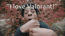 a man with a surprised look on his face says i love valorant .