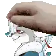 a hand is putting a cookie on top of a furry character .