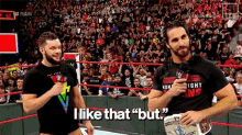 two men are standing in a wrestling ring and one of them is saying `` i like that '' .