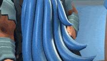a close up of a person 's long blue hair