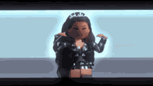 a doll with a tiara on her head is standing in front of a microphone